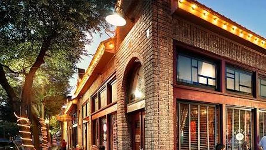 An evening street in the Bishop Arts District.