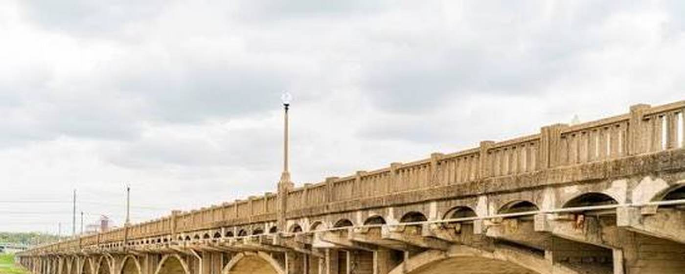The concrete arches of the viaduct crossing the Trinity between Oak Cliff and downtown Dallas.